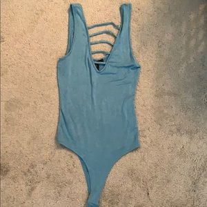 Blue body suit with details